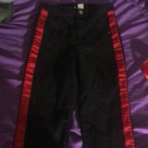 Black jeans with red stripes on the side